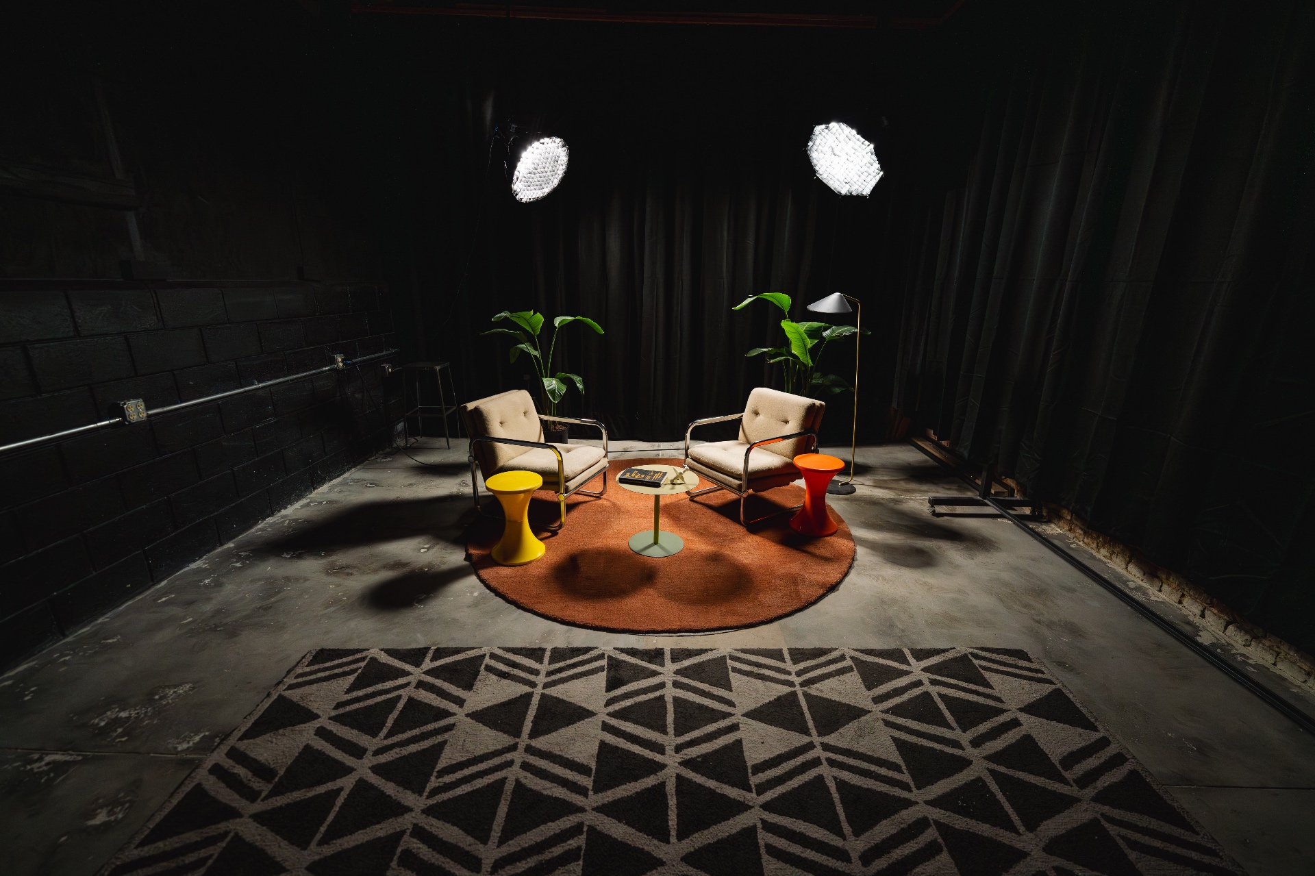 The podcast suite — walnut paneling, broadcast microphones